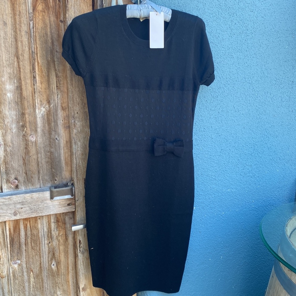 Black knit pull over dress with a pretty lace overlay waist